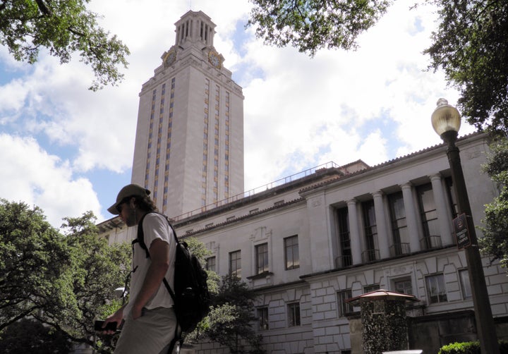 A student walks at the University of Texas campus in Austin, Texas, June 23, 2016.