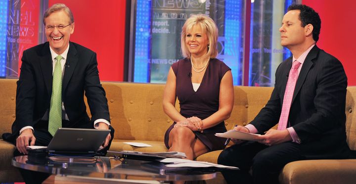 Steve Doocy, Gretchen Carlson and Brian Kilmeade at the Fox studios in 2011 in New York City.