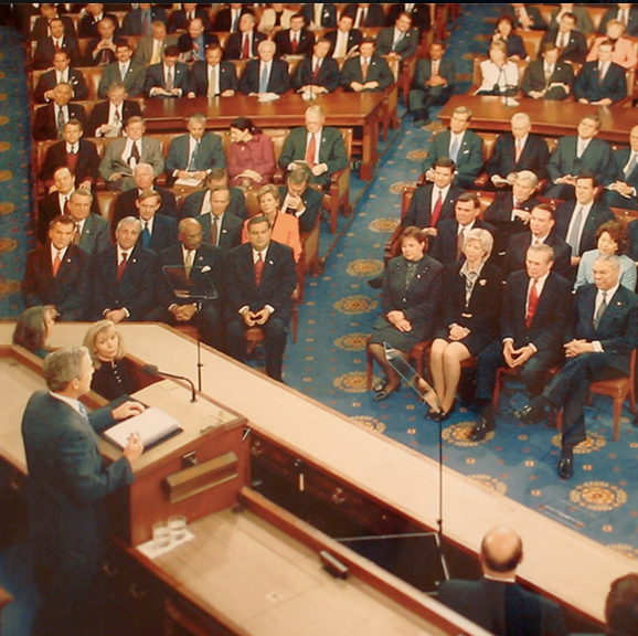 Can you spot Boehner partway up the aisle?