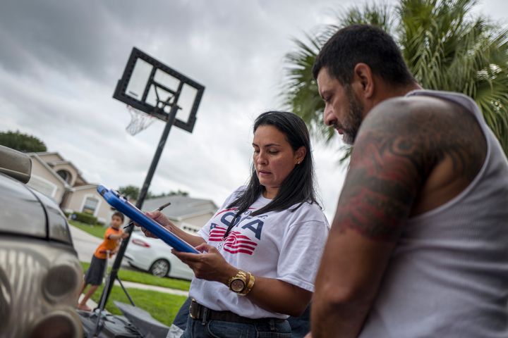 Mi Familia Vota registers voters in a Puerto Rican neighborhood in Kissimmee, Florida.