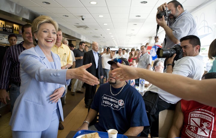 Hillary Clinton greets customers at a San Juan, Puerto Rico, bakery in 2008 during her first White House bid.