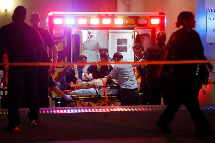 <strong>Emergency responders administer CPR to an unknown patient after gunmen opened fire during a Black Lives Matter protest in Dallas. </strong>
