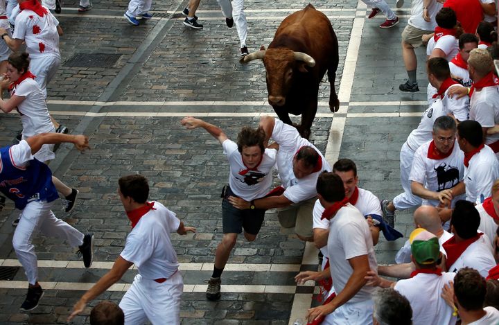 At least 16 people were hospitalized during the second day of Pamplona's running of the bulls festival.