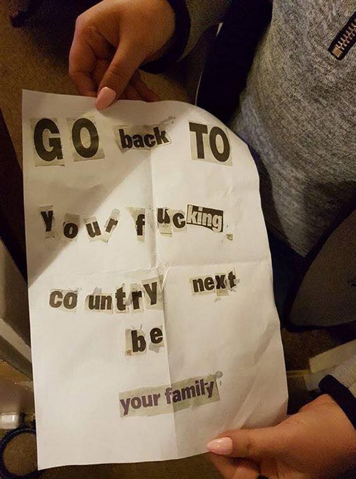The sinister note left at the scene of the fire telling the family to go 'back to your fucking country'