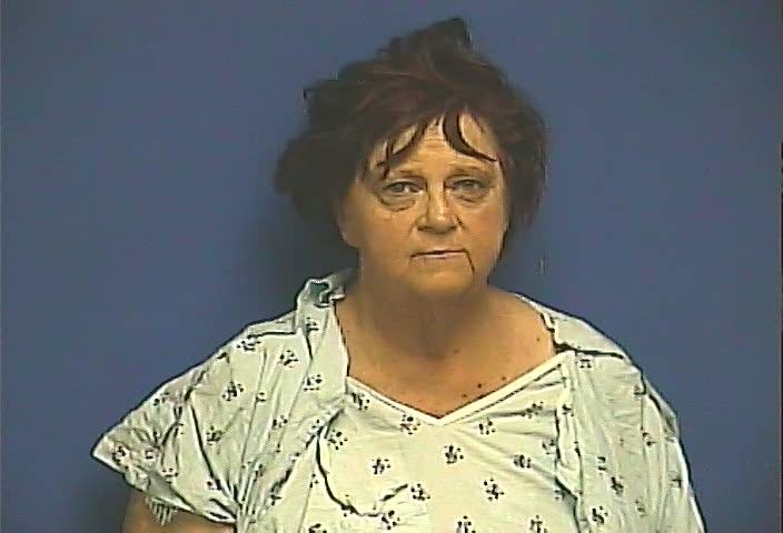 Martha Ligon is accused of randomly shooting at people after a car chase, then fatally shooting her husband.