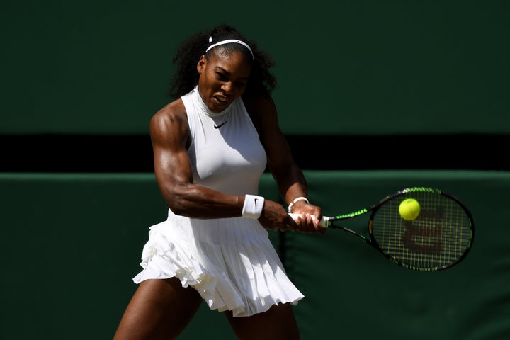 Williams plays a backhand.