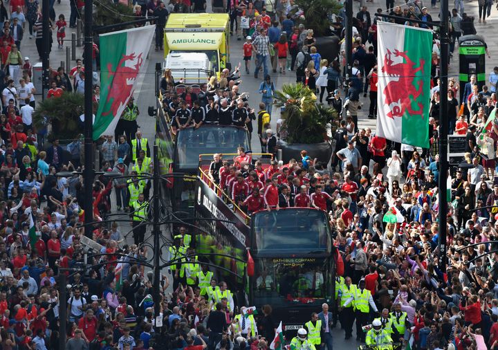 Wales Football squad head down St Mary's street on their bus parade around Cardiff