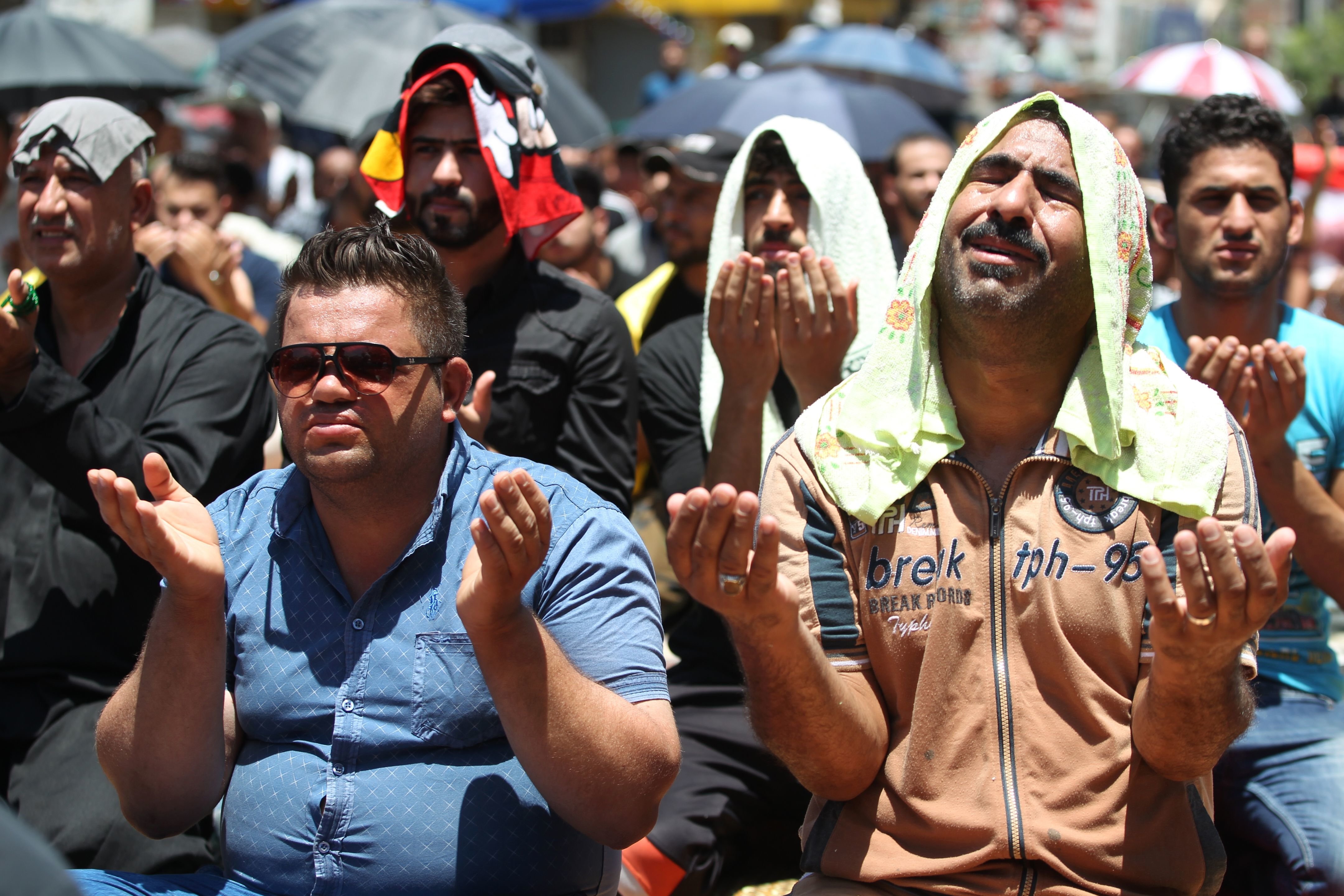 Iraqis Come Together To Pray At Site Of Baghdad Bombing | HuffPost