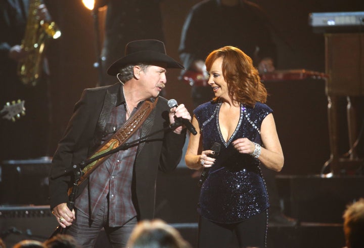 Kix Brooks and Reba McEntire perform onstage at the 49th annual CMA Awards at the Bridgestone Arena on November 4, 2015 in Nashville, Tennessee.