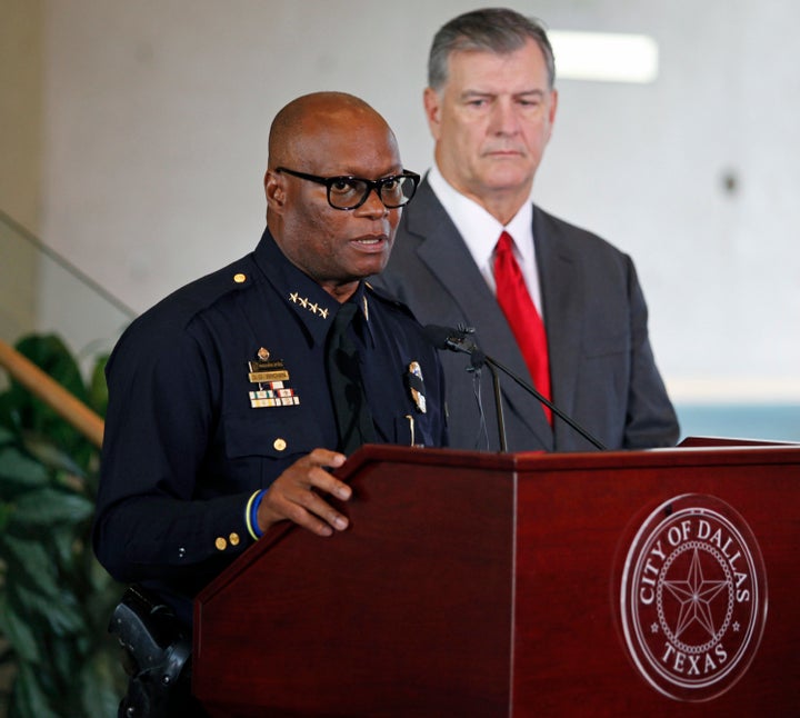 Dallas Police Chief David Brown speaks in front of Dallas Mayor Mike Rawlings