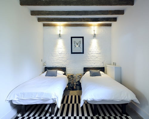 <a href="http://www.houzz.com/photos/34341972/Warborne-Farm-The-Old-Stables-farmhouse-bedroom-south-east" target="_blank">Original photo</a> on Houzz