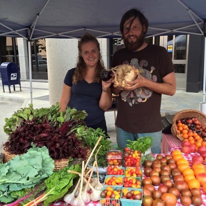 Farmers with "ugly" produce at an event by Ugly Food of the North.