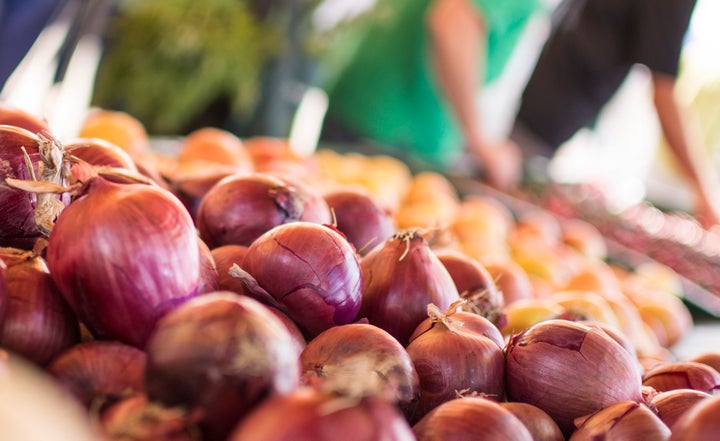 These red onions at a Sacramento farmers market show how beautiful produce can be, regardless of its shape.