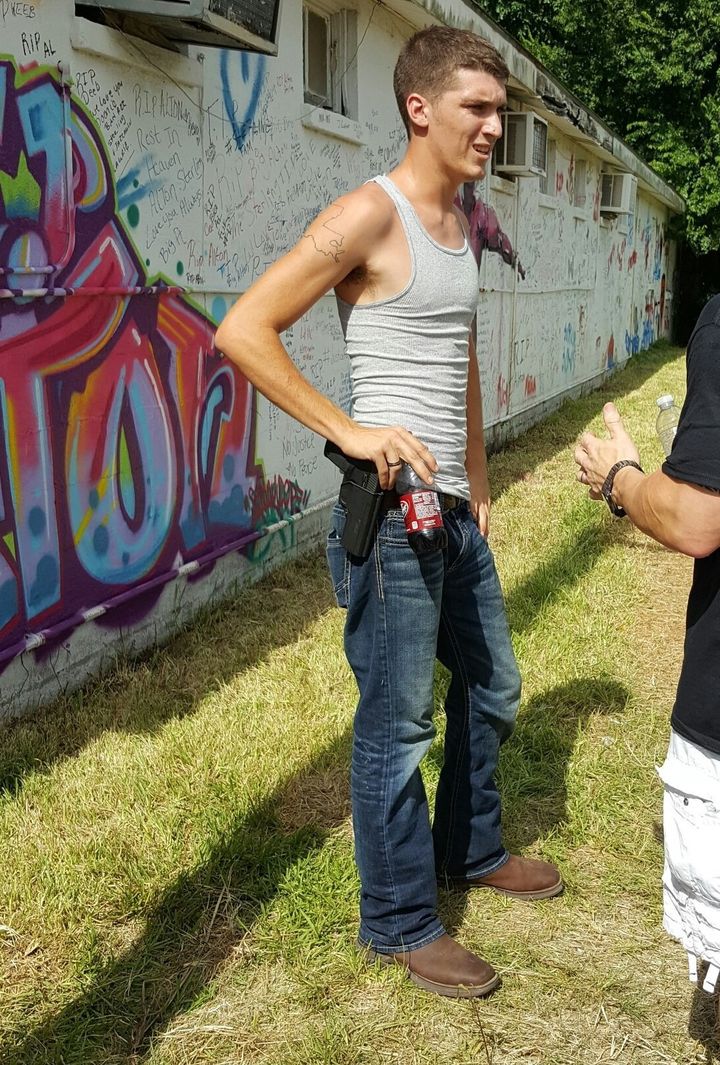 Jake David showed up with a gun at Friday's demonstration in Baton Rouge.