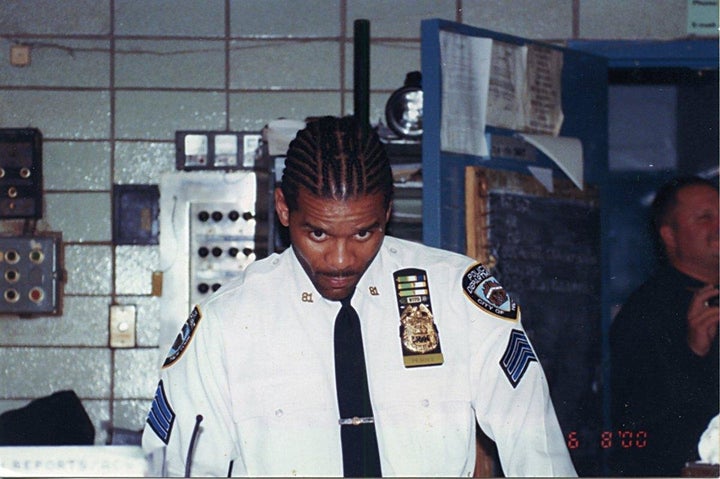 Corey Pegues, a former NYPD officer, shows off his corn rows after being promoted to lieutenant.