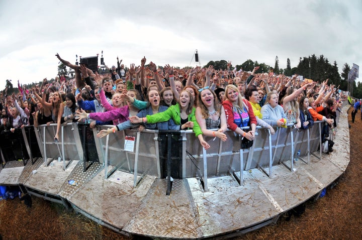 Fans watch Jess Glynne.