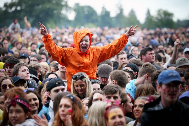 Fans watch Tinie Tempah on the main stage.