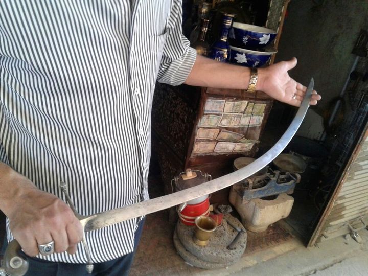 Abu Abdo holds a dagger called “Karda”. Eastern Ghouta, June, 2016.