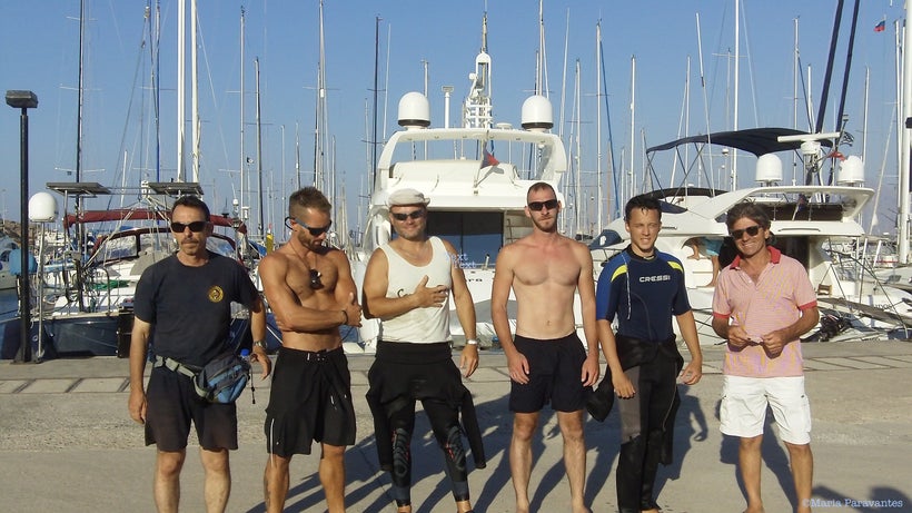 The younger generation making the difference: volunteer divers pose after cleaning the seabed of Ammos Beach, at Agios Nikolaos, Crete during Ecoweek.