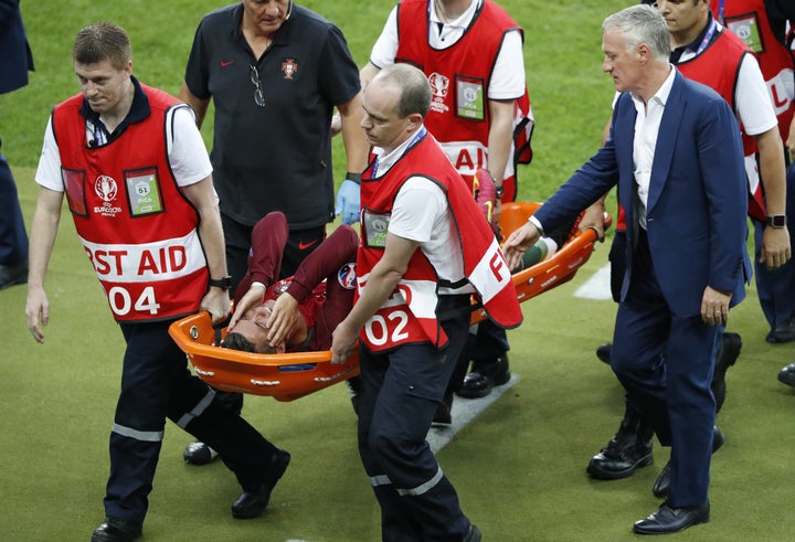 Cristiano Ronaldo was in tears after a knee clash resulted in him being stretchered off the field