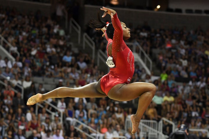 Simone Biles, shown here in the floor exercise, is heading to the Olympics for the first time.