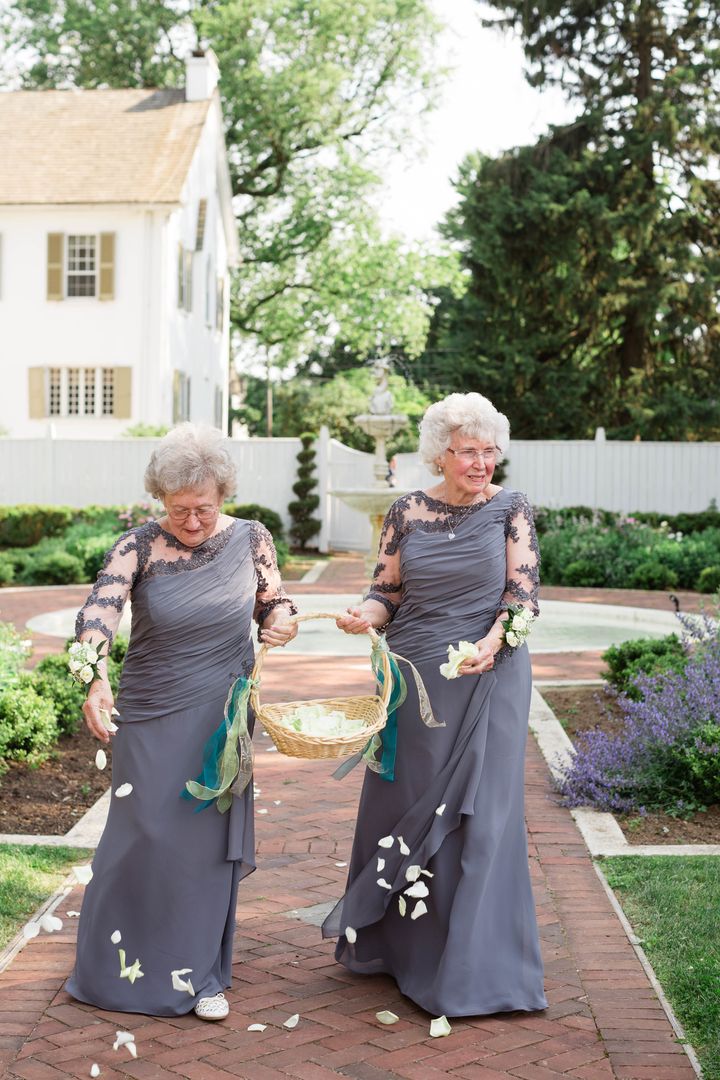 On the right, the bride's 75-year-old grandma Joyce. On the left, the groom's 74-year-old grandma Drue.
