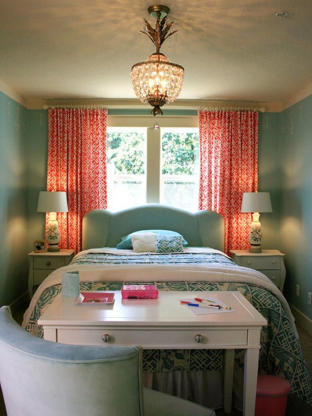 This eclectic bedroom uses coral as a bright accent. 