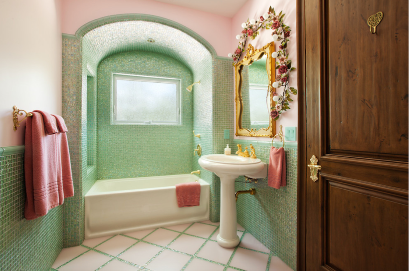 Mint tile is punctuated with coral and gold accents. 