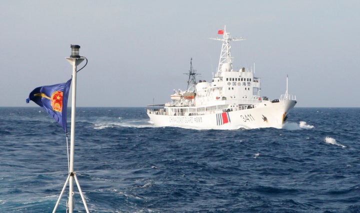 Chinese ships have previously followed Vietnamese vessels that neared China's oil rig in the disputed waters of the South China Sea.