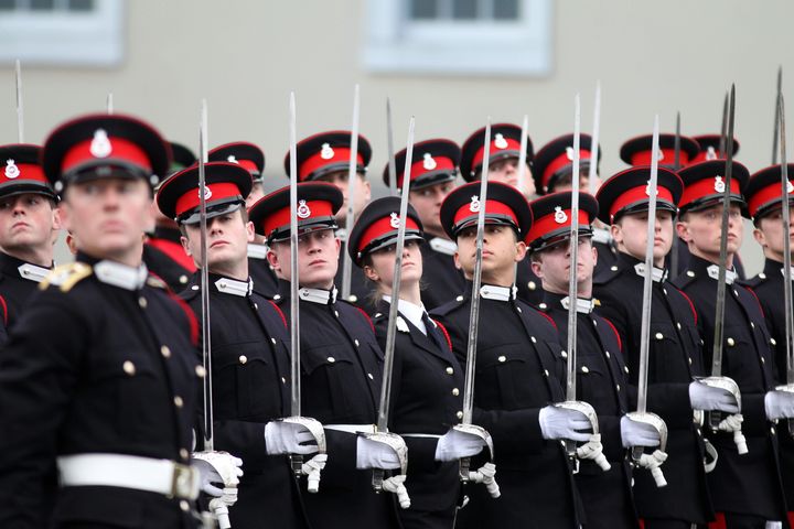 <strong>Male and female cadets platoons pass out together for the first time during the Sovereign's Parade at the Royal Military Academy Sandhurst.</strong>