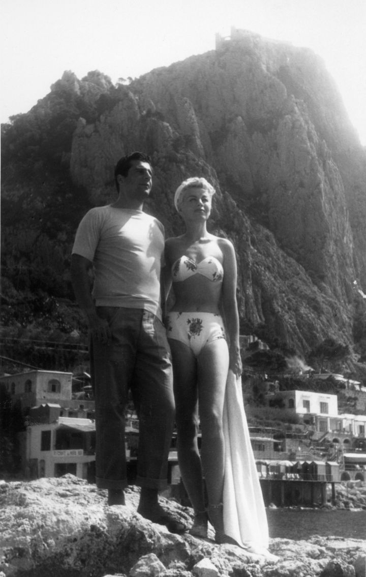 Burlesque Queen Lili St. Cyr on her honeymoon in Capri with restauranteur Armando Orsini.