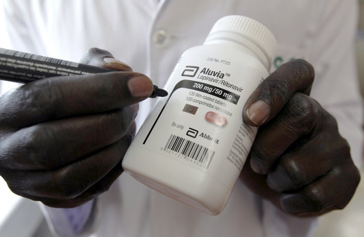 Michael Otieno, a pharmacist, dispenses anti-retroviral (ARV) drugs at the Mater Hospital in Kenya's capital Nair