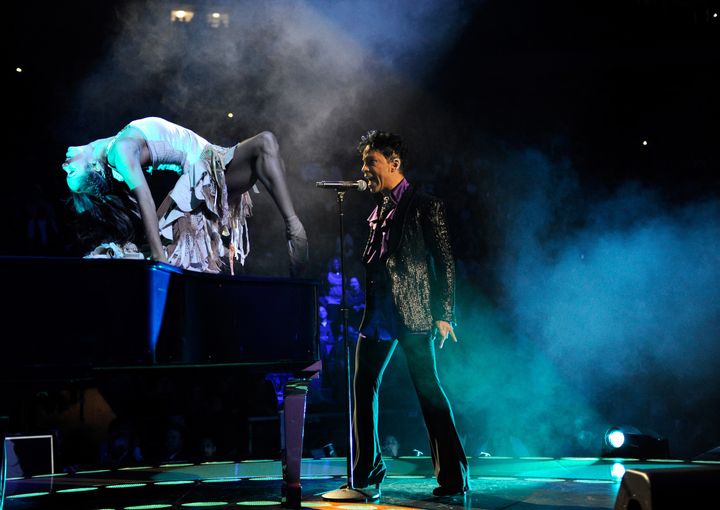 Prince performs with Misty Copeland during the "Welcome 2 America" tour on Dec. 29, 2010, in New York City.