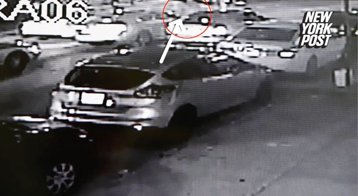 Surveillance video appears to show Delrawn Small approaching off-duty NYPD officer Wayne Isaacs' car on July 4.