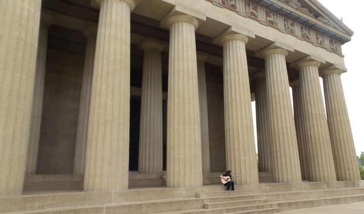 Alex Stopp Roberts playing on the steps of Nashville's Parthenon.