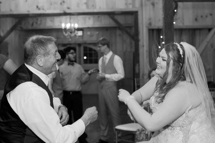 The bride dancing the night away with her grandpa. 