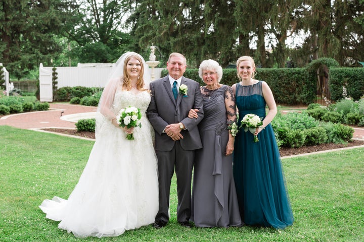 The bride with her paternal grandparents and her sister Bethany. 