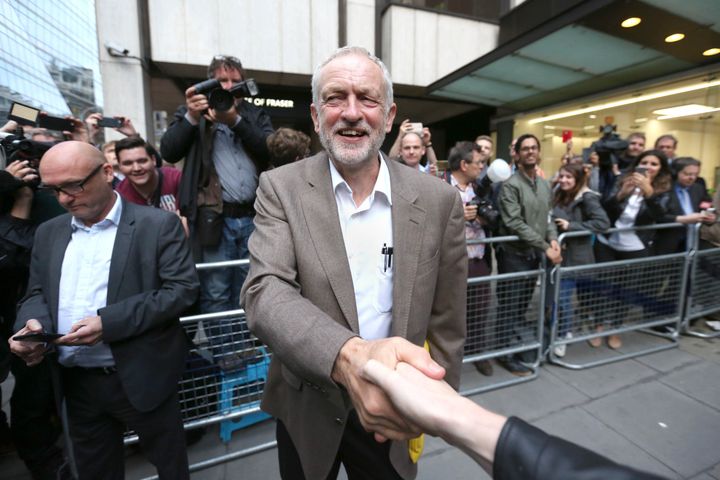 Jeremy Corbyn leaves Labour HQ after being told he would automatically be on the ballot
