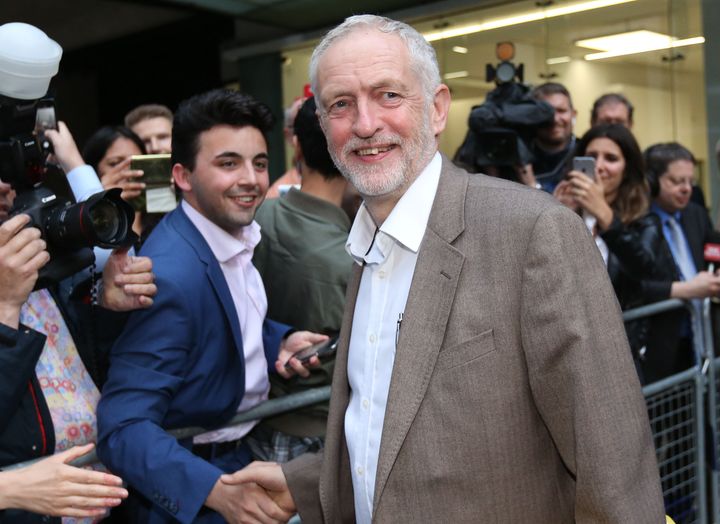 Corbyn shook hands and spoke with jubilant supporters who chanted his name