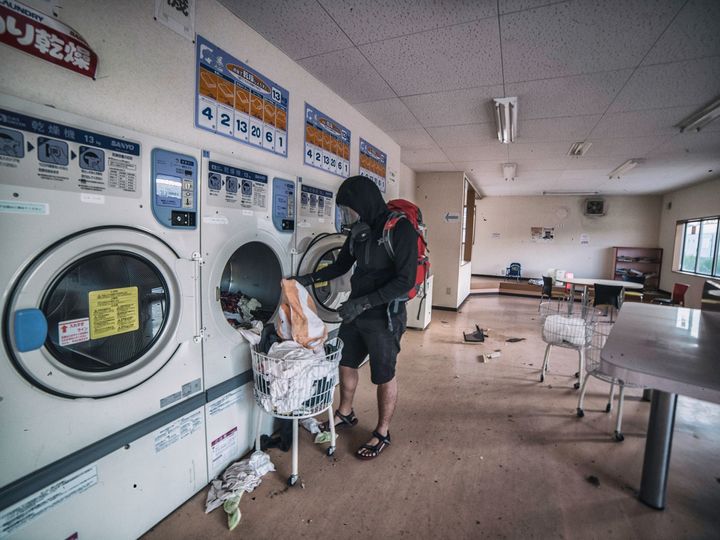 Many of the washers still have clothes in them; left behind when the customers fled in panic.