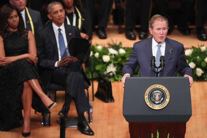 Former President George W. Bush delivers remarks during an interfaith memorial service, honoring five slain police officers, at the Morton H. Meyerson Symphony Center on Tuesday in Dallas.