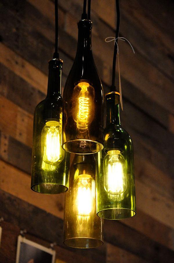 A chandelier is made from old wine bottles.