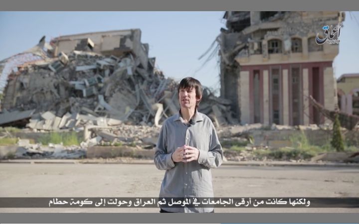 Pale and gaunt-looking British journalist John Cantlie, kidnapped in November 2012 by hardline rebels in Syria, appears in an Islamic State propaganda video released on July 12. 
