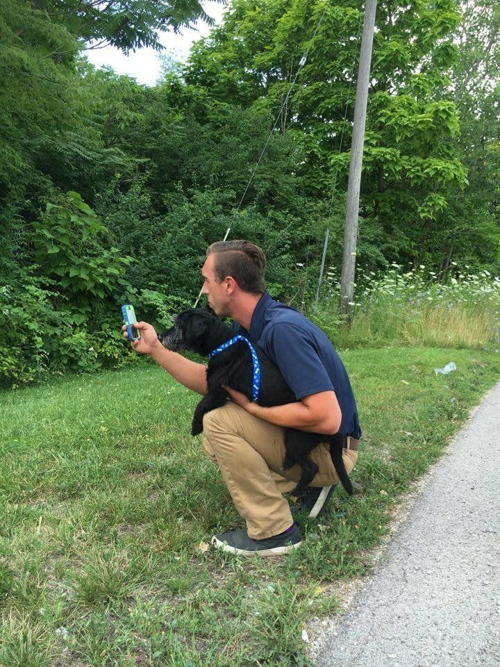 Phil Peckinpaugh and shelter dog Winston, catching a Squirtle.
