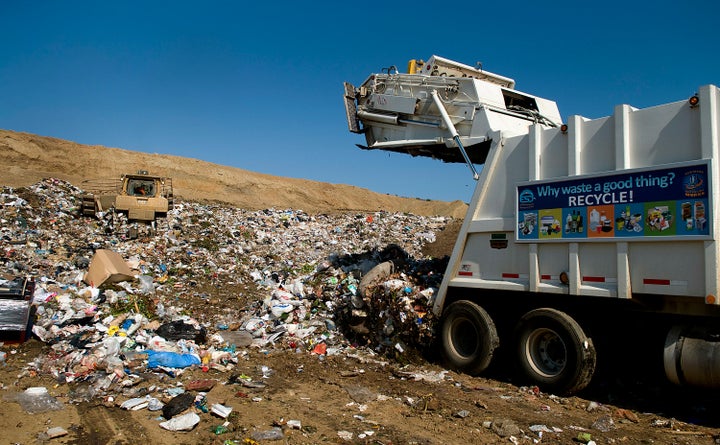 Crews unload trash at the Miramar Landfill in San Diego, California, U.S. Miramar Landfill, an environmentally secure and lined facility, captures methane, a greenhouse gas byproduct, to be used to provide 90 percent of the fuel to power electrical generators at the Metropolitan Biosolids Center and North City Water Reclamation Plant. 