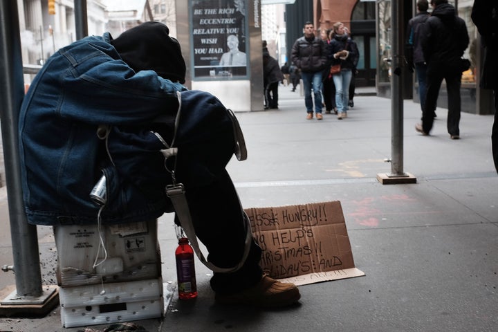 NEW YORK, NY - DECEMBER 21: A homeless man rests on the street on December 21, 2015 in New York City. On Monday the homeless advocacy group Picture the Homeless joined supporters and homeless individuals at a news conference to announce a plan for legal action against New York City's treatment of the homeless. Homelessness in New York City is at an all time high despite the liberal administration of Bill de Blasio. Picture the Homeless accused the city and police of targeting the homeless by forcing them to move from public spaces and for confiscating their property. (Photo by Spencer Platt/Getty Images)Embed<span>Url</span><span>Embed</span><span>Asset Code</span>Enter asset codeLoad