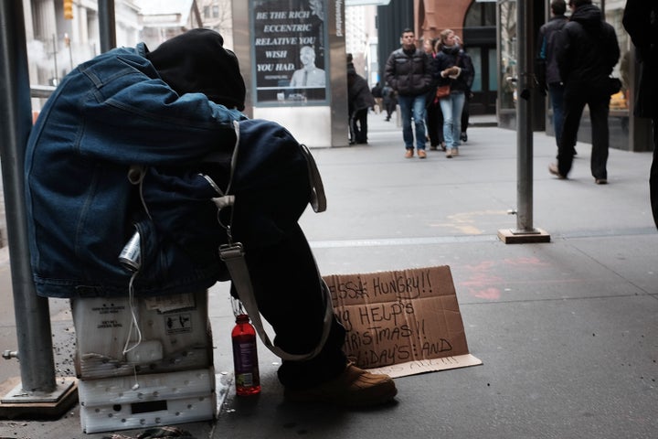 NEW YORK, NY - DECEMBER 21: A homeless man rests on the street on December 21, 2015 in New York City. On Monday the homeless advocacy group Picture the Homeless joined supporters and homeless individuals at a news conference to announce a plan for legal action against New York City's treatment of the homeless. Homelessness in New York City is at an all time high despite the liberal administration of Bill de Blasio. Picture the Homeless accused the city and police of targeting the homeless by forcing them to move from public spaces and for confiscating their property. (Photo by Spencer Platt/Getty Images)EmbedUrlEmbedAsset CodeEnter asset codeLoad