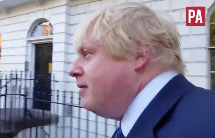 <strong>Boris Johnson walks in circles looking for his car </strong>
