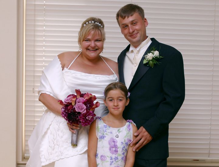 Writer Katherine Hedland Hansen on her wedding day in 2003. Her stepdaughter Haley served as flower girl. 