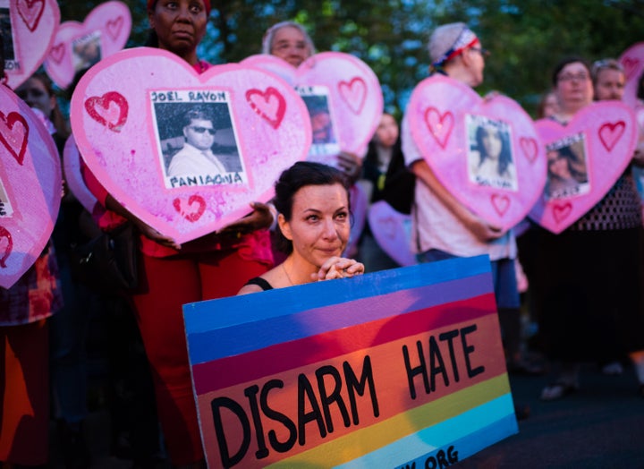 Linn Meyers, 48 of DC, cries and she listens to stories of the 49 people killed in the mass shooting in Orlando.